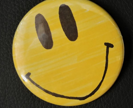 Smiley face button
