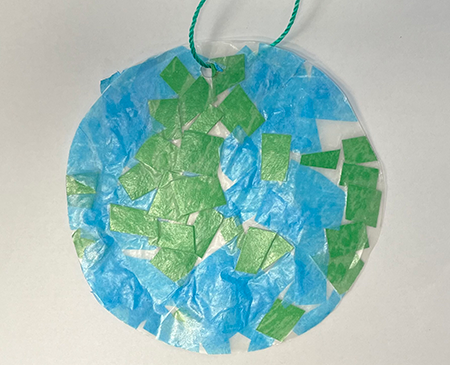 Suncatcher made of tissue paper resembling earth